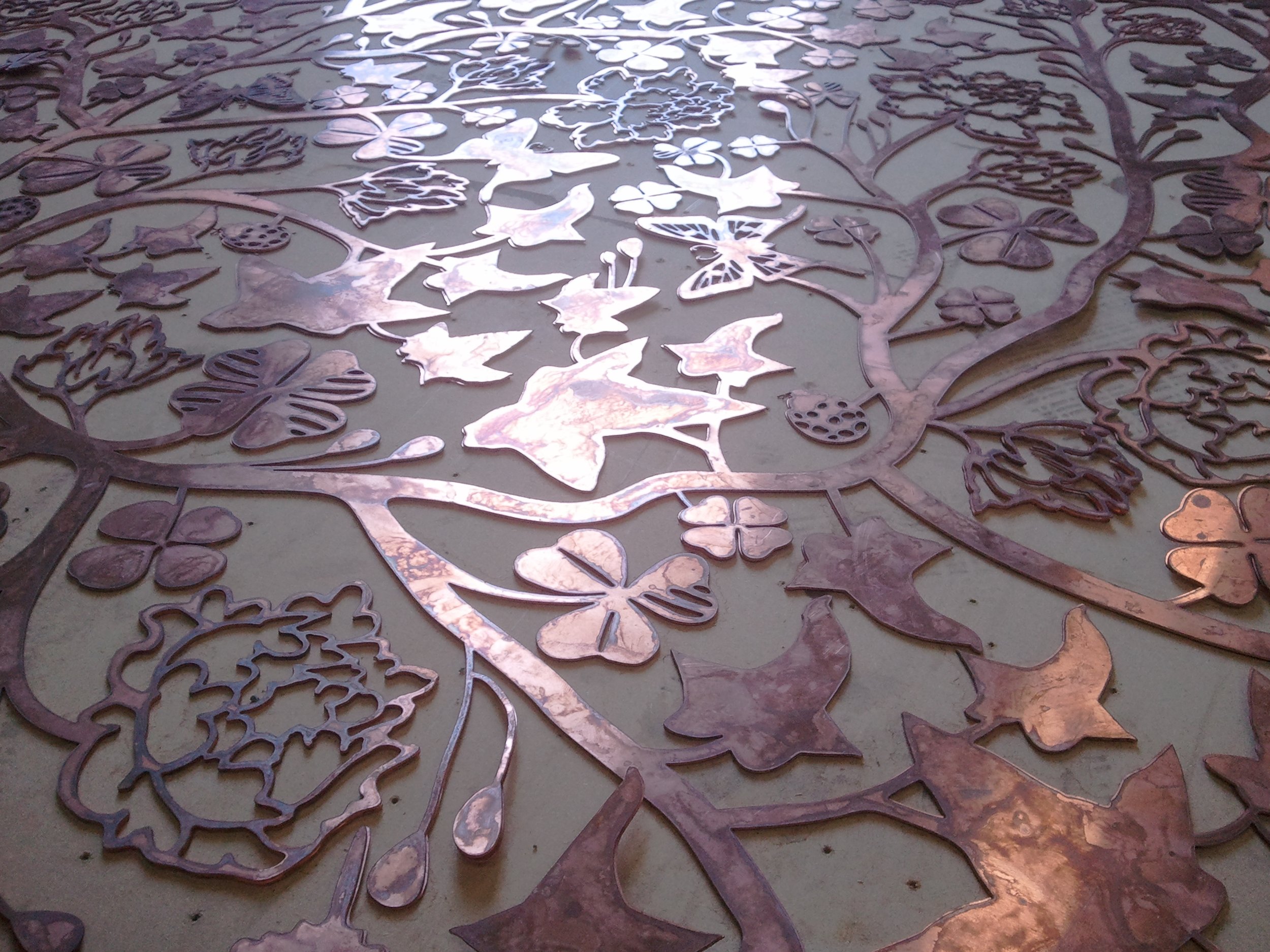 (detail) waterjet cut floral copper garland, designed and project managed by LCS