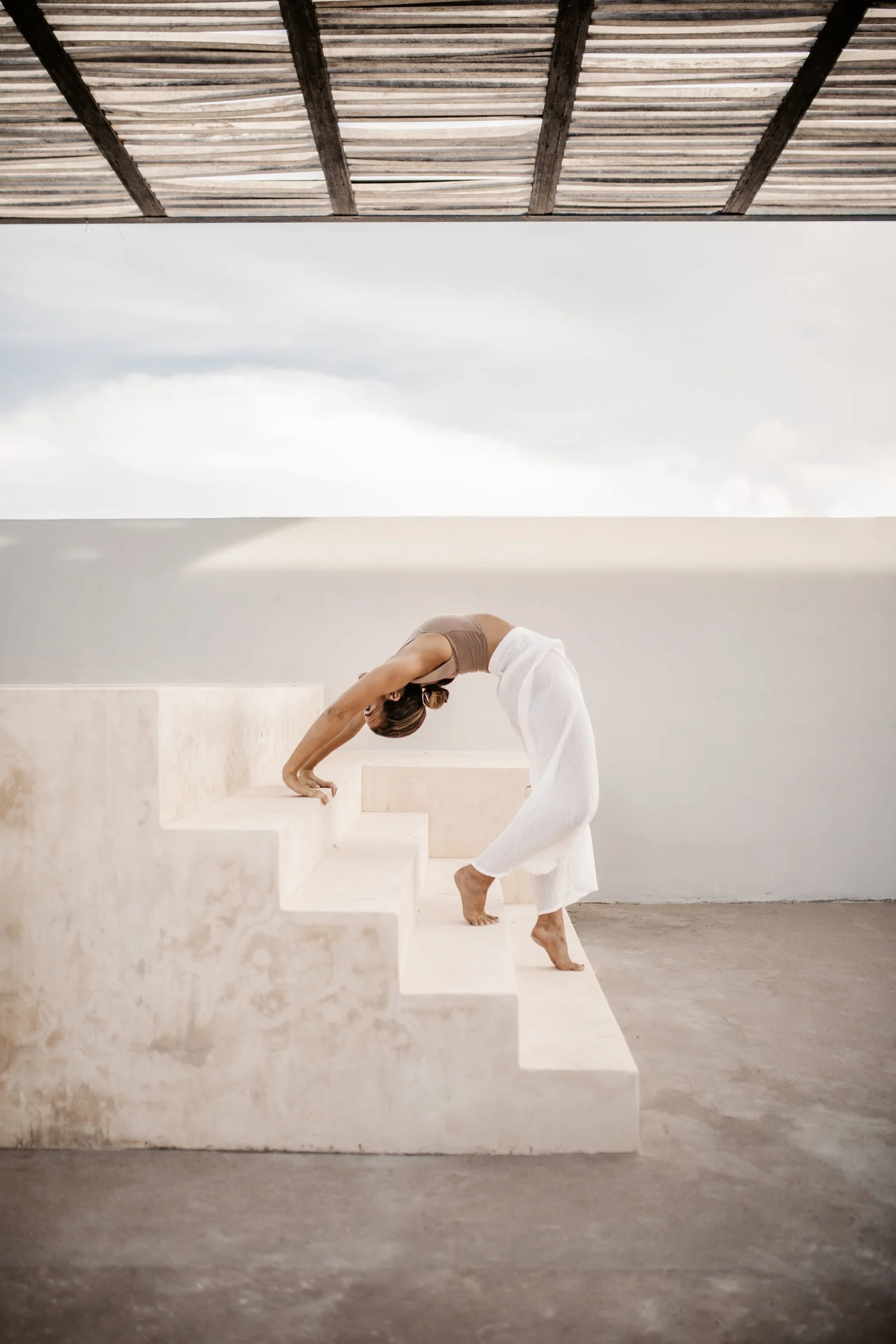 Head facilitator Lauren Coleman—founder and senior yoga teacher, portrait in natural light.