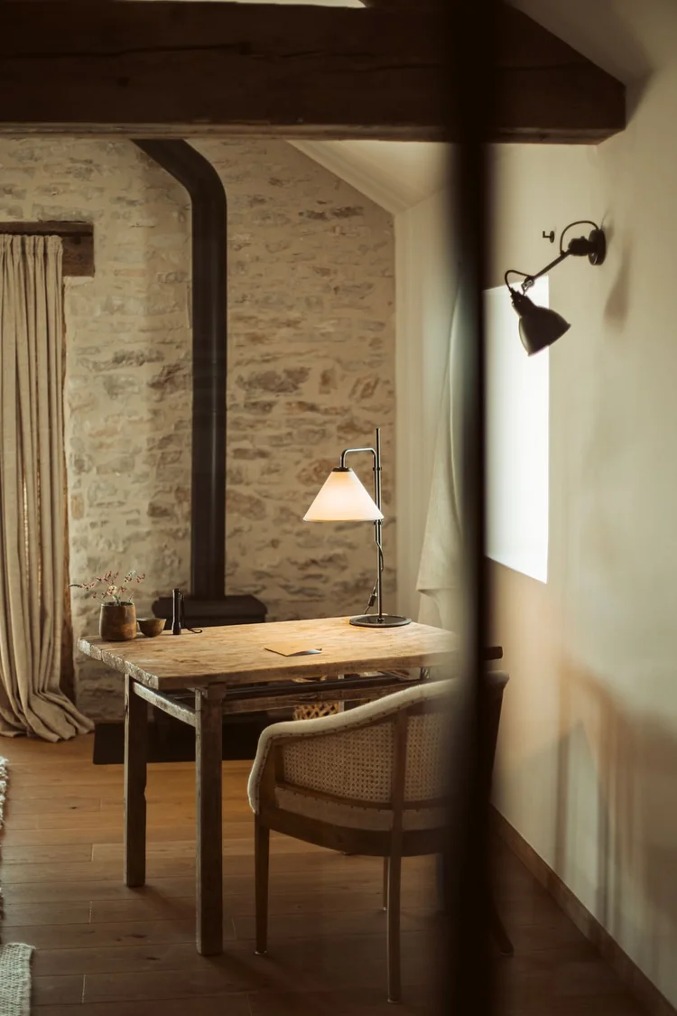 Reading nook beneath oak beams inside The Lodge at L'Esprit d'Almières