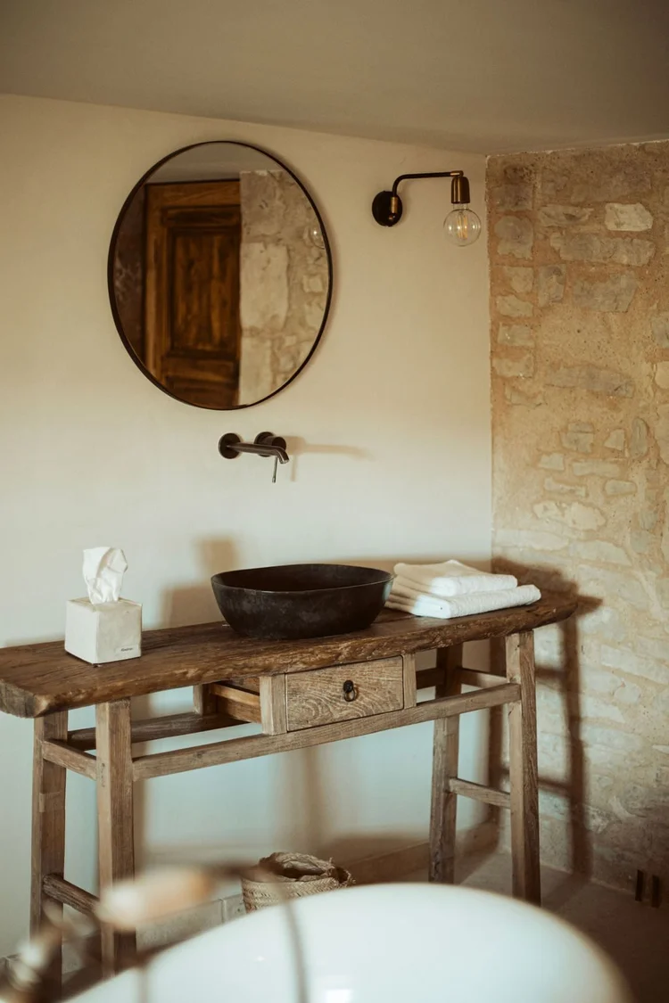 Stone vessel sink and vanity in a private Stone Suite at L'Esprit d'Almières