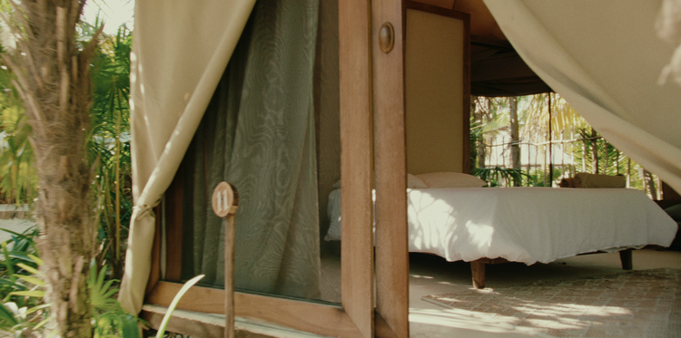Exterior view of safari-style beachfront glamping tent at Casa Maya Ka’an in the Sian Ka’an Biosphere near Tulum, Mexico