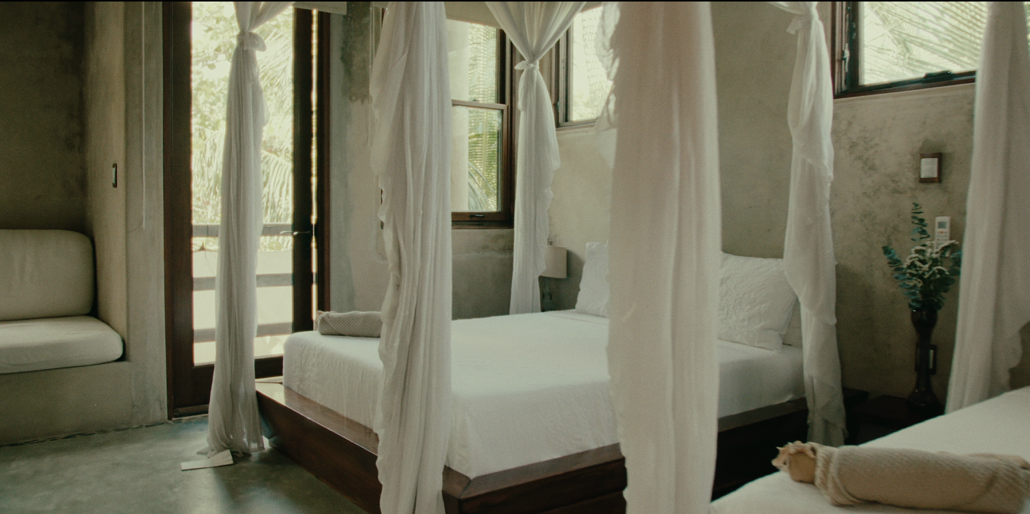 Double Queen Canopy Suite at Casa Retreats in Tulum—airy jungle-view lodging for a luxury yoga & wellness retreat.