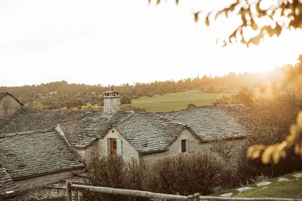 Restored stone hamlet at L'Esprit d'Almi&egrave;res, a luxury yoga retreat in the Aveyron, Southern France