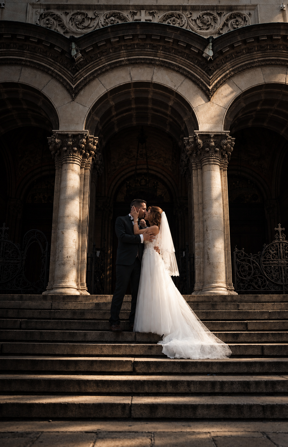 Cinematic Kiss Beneath Cathedral Arches.png