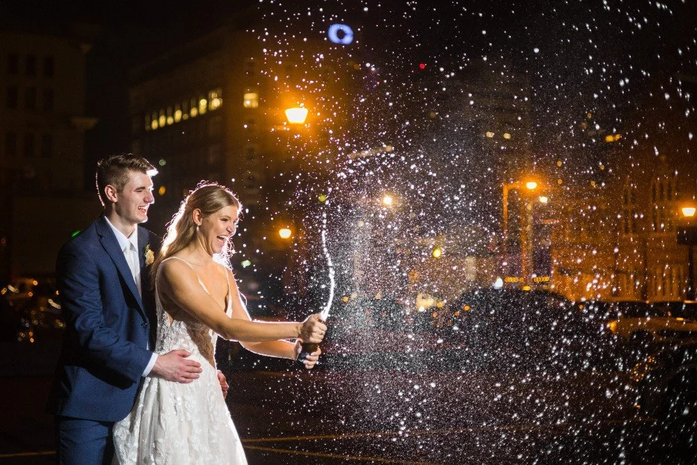 Nothing says Champagne Day quite like popping a bottle in the middle of downtown Lexington! 🥂

Maddy &amp; David took the celebration to the street&mdash;proof that love (and bubbles) make every moment unforgettable.

Photo: Megan Sweeting