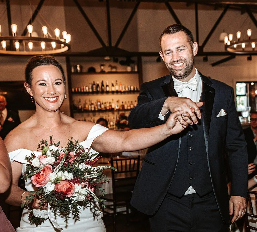 The way they entered their reception is exactly how we&rsquo;re entering the new year! Smiling, grateful, and ready to celebrate every moment. Cheers to 2026!

Photo: Eady Beth Photography