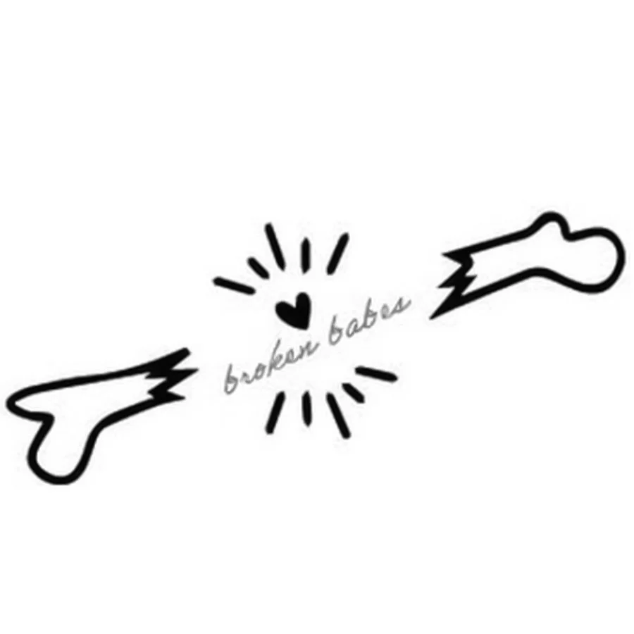 Broken babes logo with a broken bone in logo a heart in the center and cursive text that says borken babes