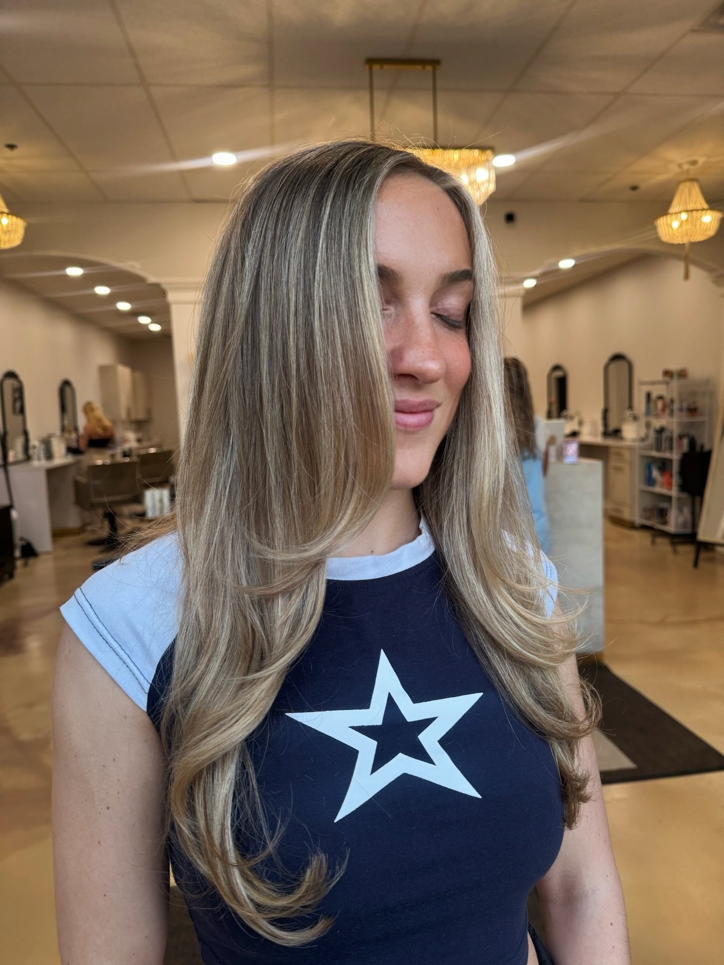 Custom-blended blonde highlights to enhance her natural beauty and add seamless dimension 🤍

Hair by Ninalee @one_hairstateofmind 

This month, buy two Bumble &amp; Bumble products and get one FREE! Shop in salon 🛍️