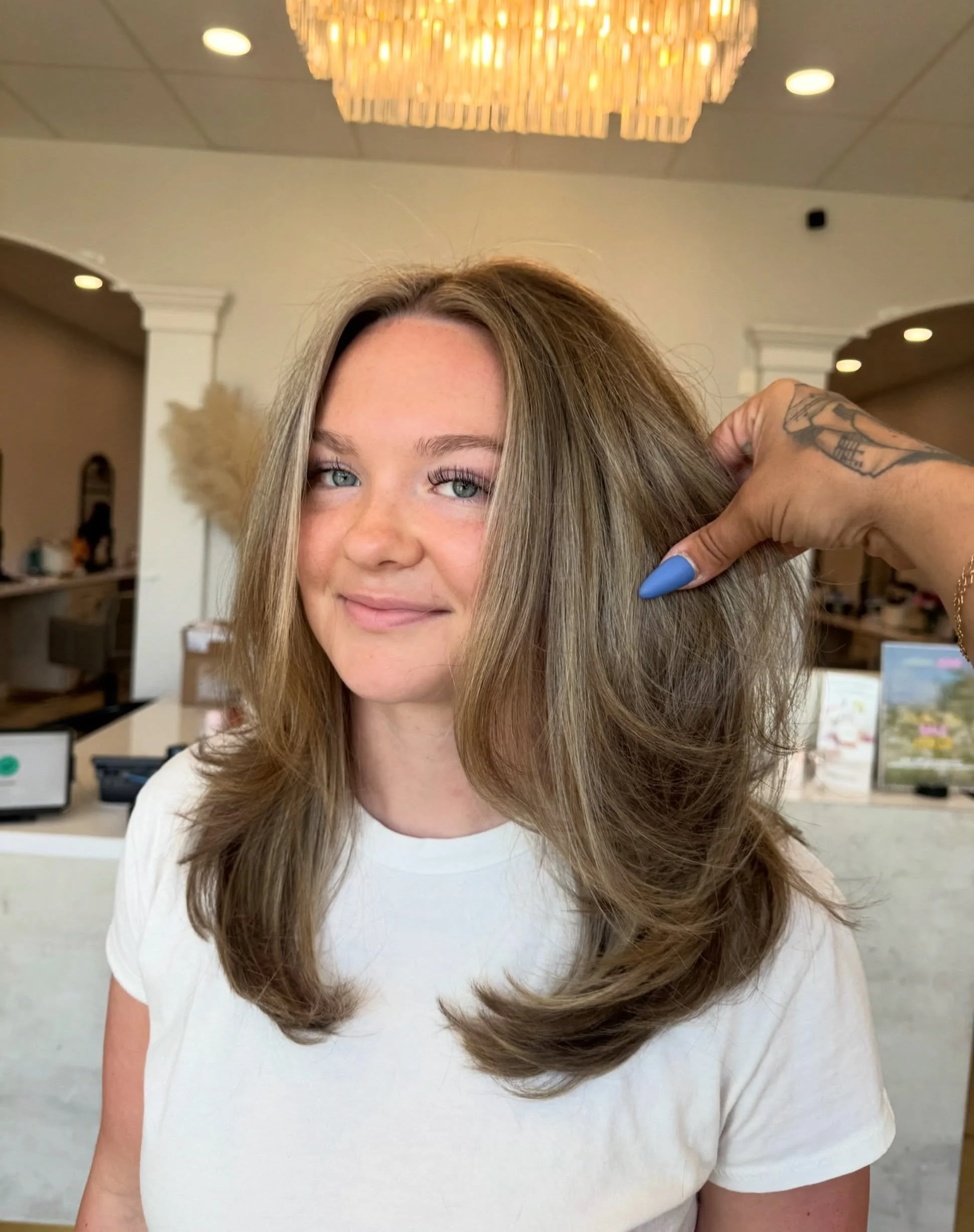 The most gorgeous layered haircut 🩵

Hair by Ninalee @one_hairstateofmind 

We can&rsquo;t wait to see you in salon &amp; create your dream look! To make an appointment, call our front desk team at 517.225.5958 or book online at district308.com/book
