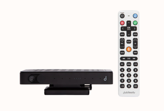 A black TV streaming device and a white remote control with various buttons, placed against a plain white background.