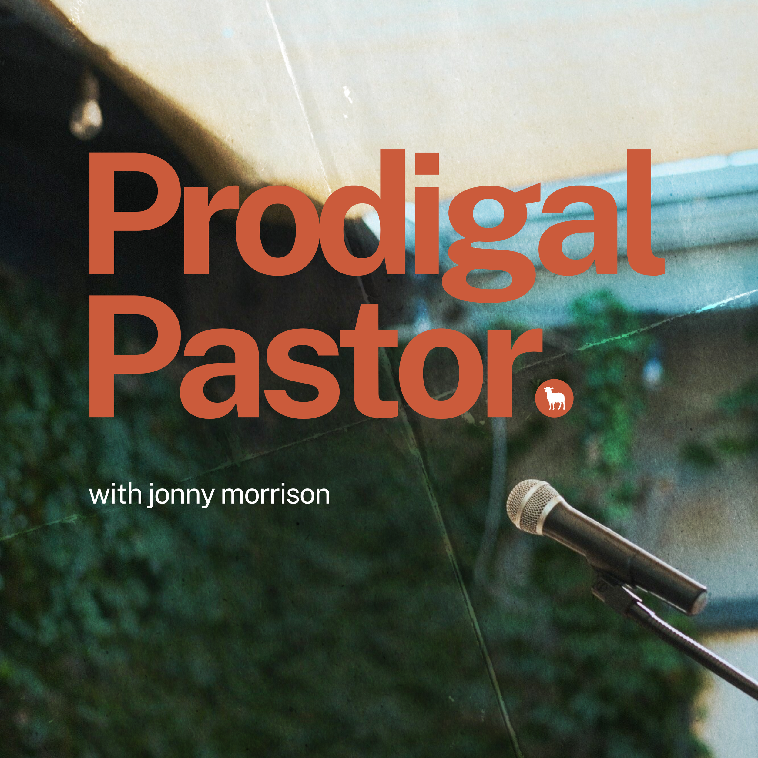 Podcast cover image with large orange text reading 'Prodigal Pastor' and a small white sheep icon, followed by smaller white text reading 'with jonny morrison' on a background of a microphone and greenery.
