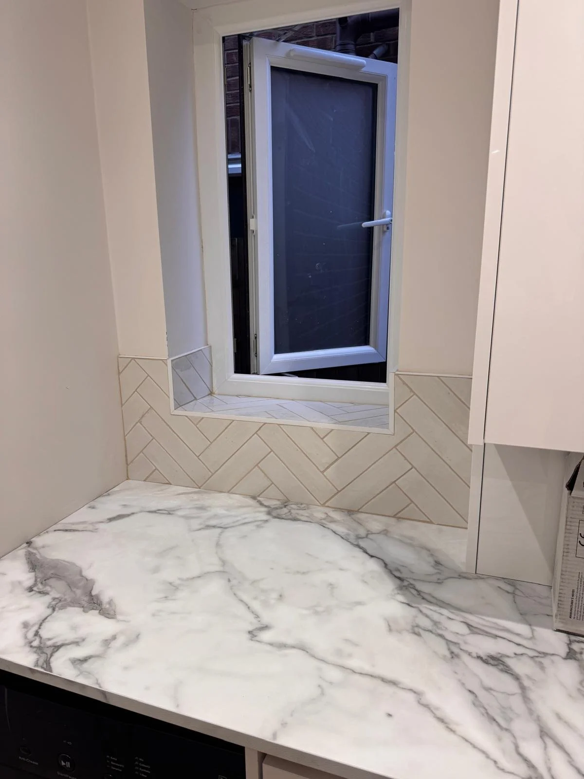 Splashback And Window Reveal Tiling