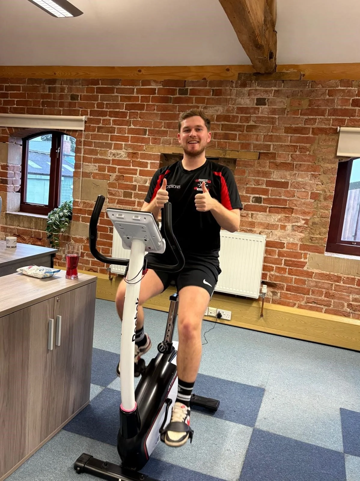 Teige on Bike.jpg