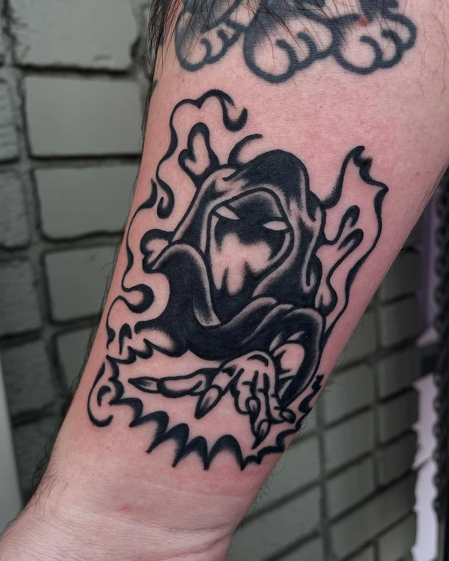 A wizard? A grim reaper? Or a secret third thing?