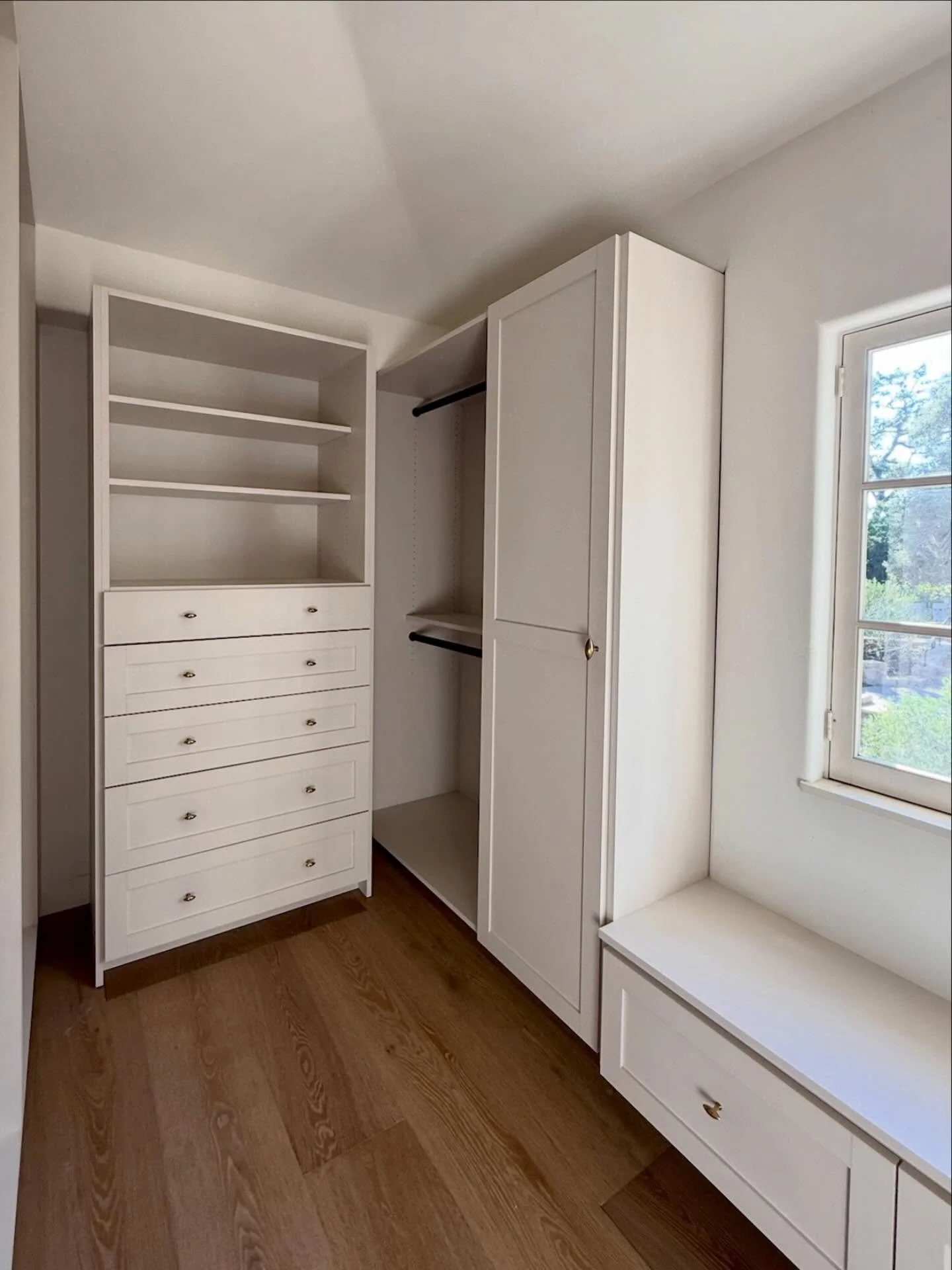 Pull-out shelves make it so easy to access your favorite sweaters and purses while keeping storage organized