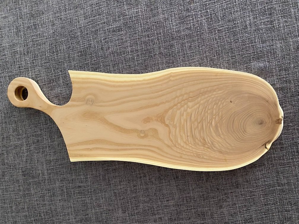Russian olive charcuterie board with handle.