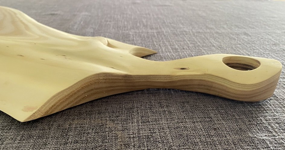 Russian olive charcuterie board with handle.
