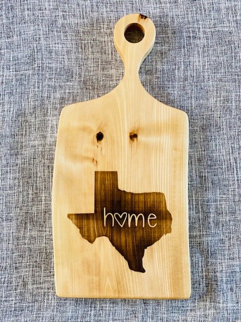 Custom engraved elder wood hanging charcuterie board.