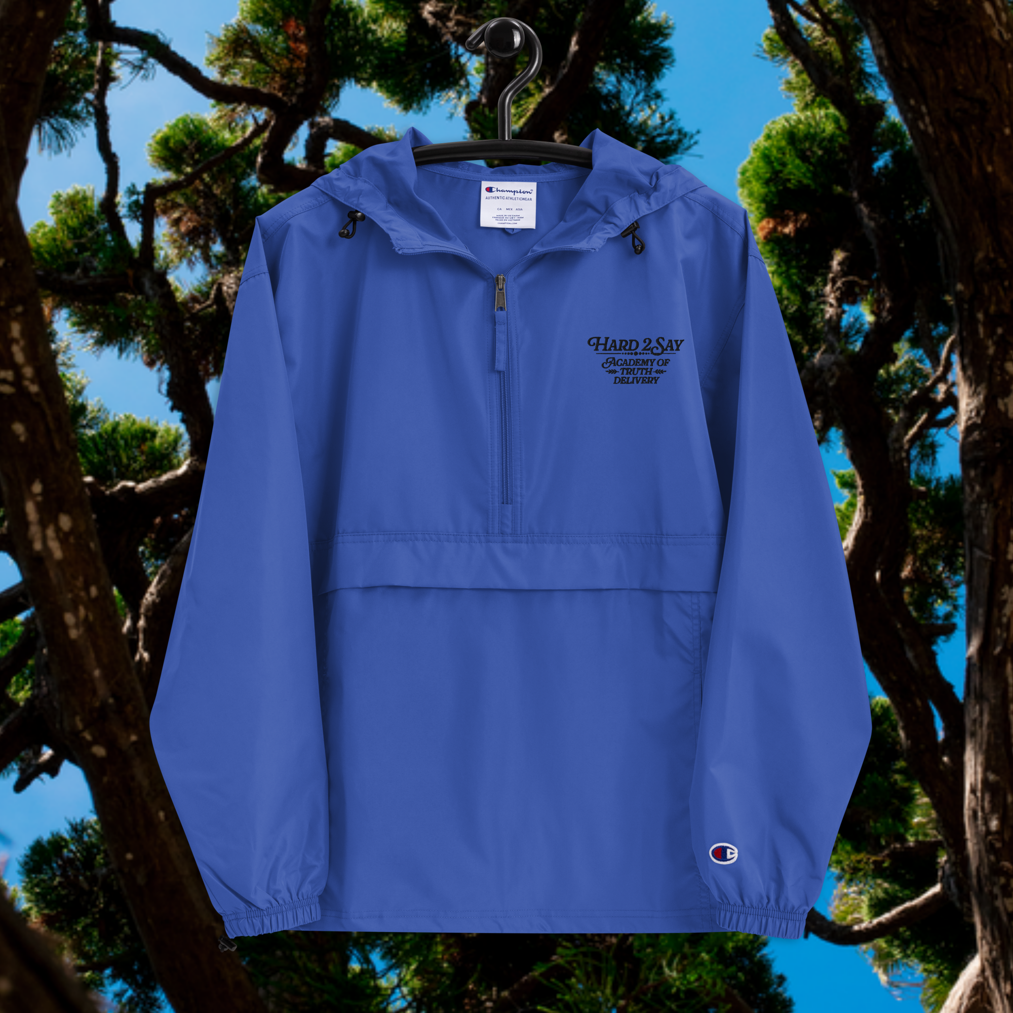 unisex-champion-packable-anorak-royal-blue-front-6a8fe11dd3e2f.png