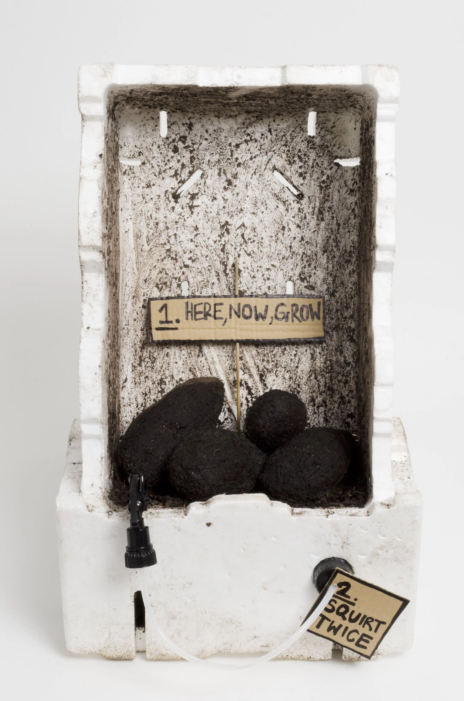 Momentum, 
HERE, NOW, GROW
found objects, styrofoam, plastic, knitted wool, dirt/soil, cardboard, wood
125 x 75 x 75 cm, 2013©