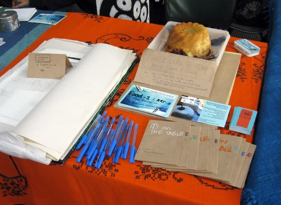 Spring Zine Fair, 
It's on the table zine/performance, homemade bundt cake, handmade books, pens, 2012©