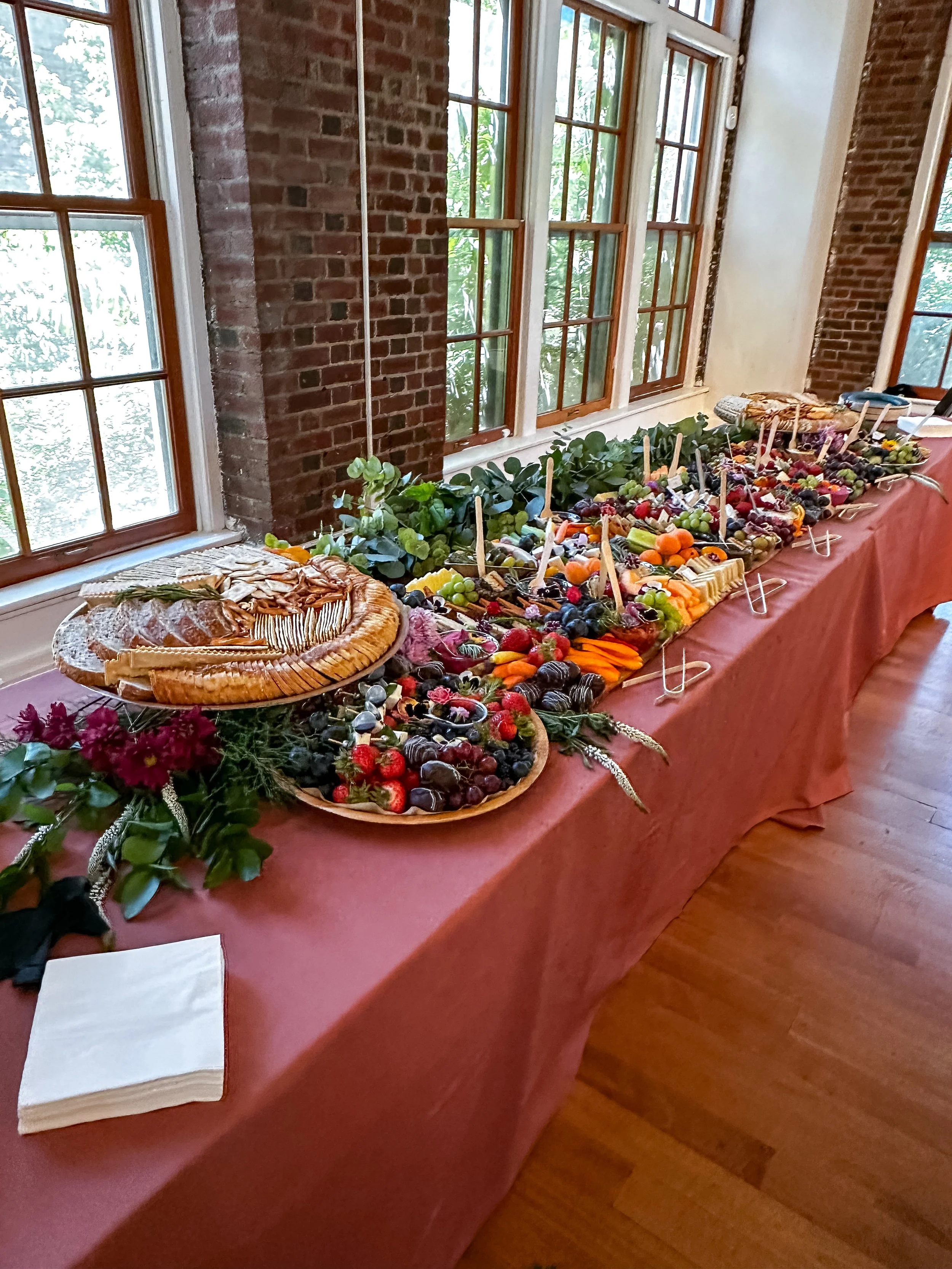 six foot vegan grazing table for a wedding cocktail hour by Veg on Board at Prospect Park Picnic House in Brooklyn, NY