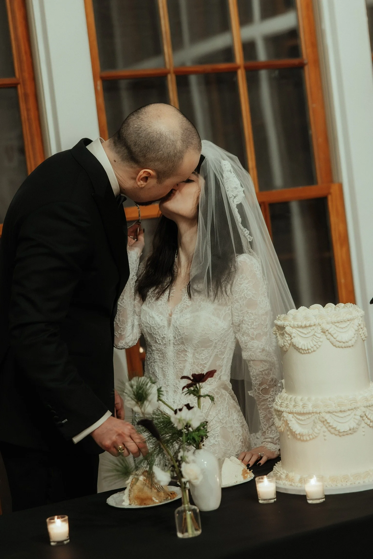 Two-tier vintage vegan wedding cake at Prospect Park Picnic House in Brooklyn