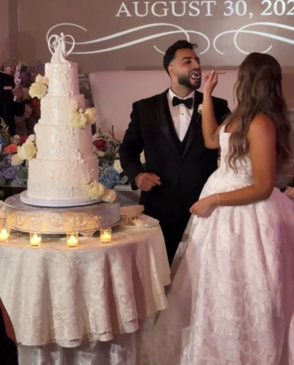 Couple eating vegan and gluten-free wedding cake by Veg on Board at The Larkfield in East Northport NY