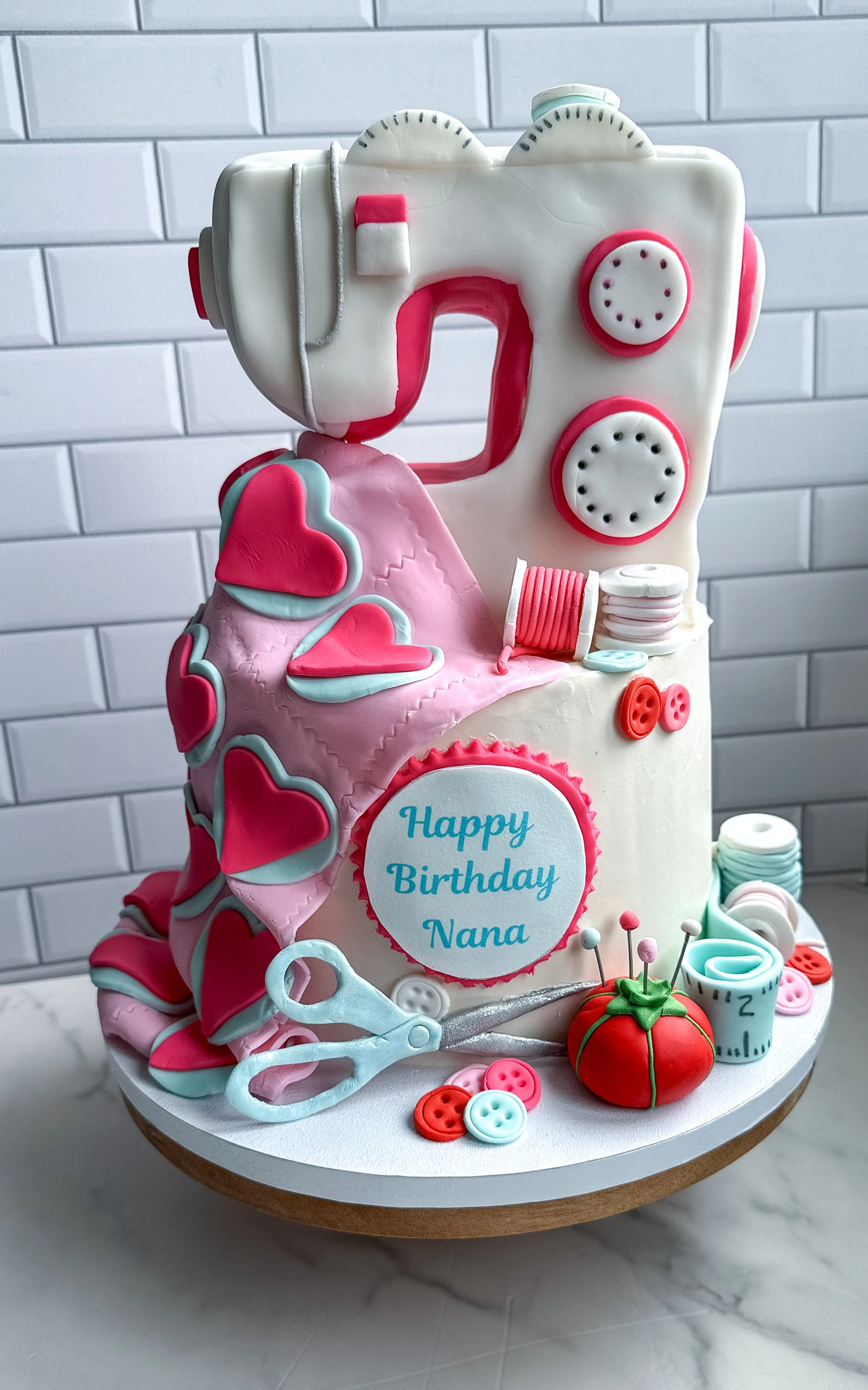 Custom sewing machine birthday cake with fondant details for a celebration on Long Island