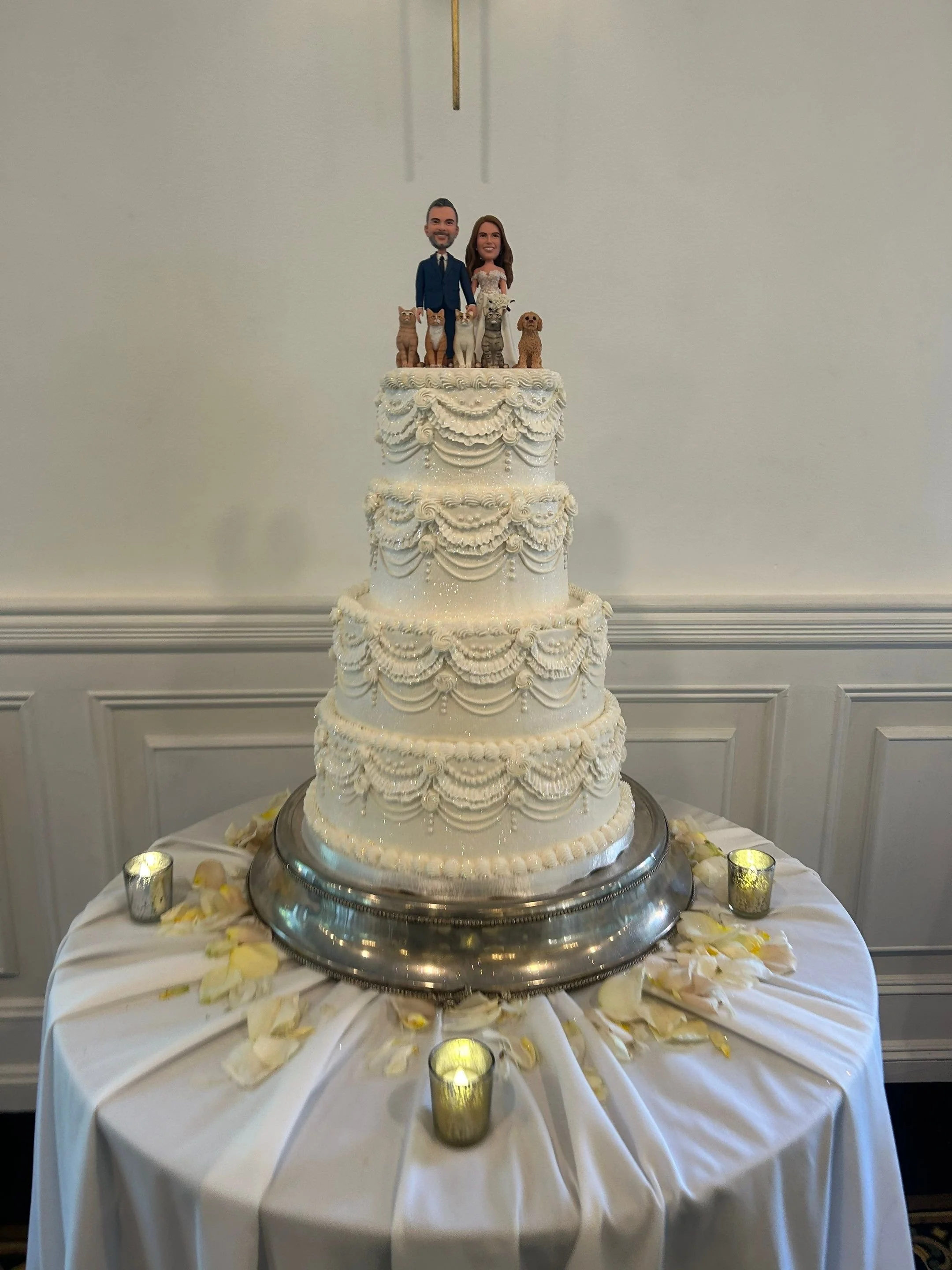 four tier vegan wedding cake by veg on board at flower field celebrations in st James ny