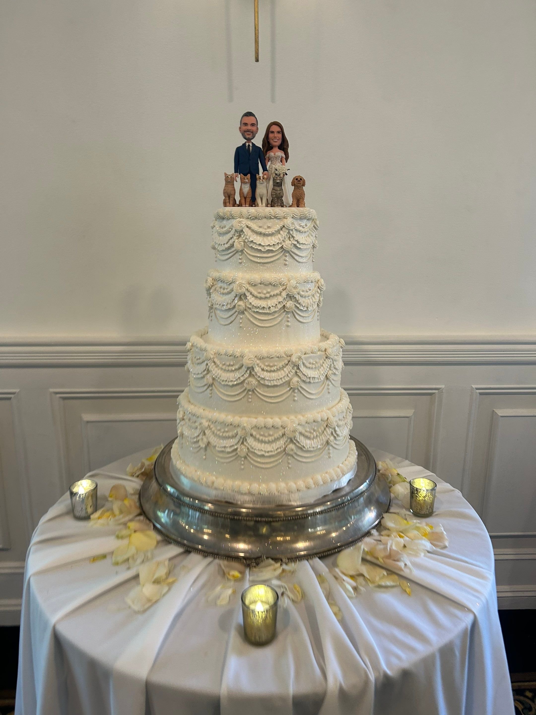 Four tier vegan wedding cake by veg on board set up at Flowerfield Celebrations in St James, NY