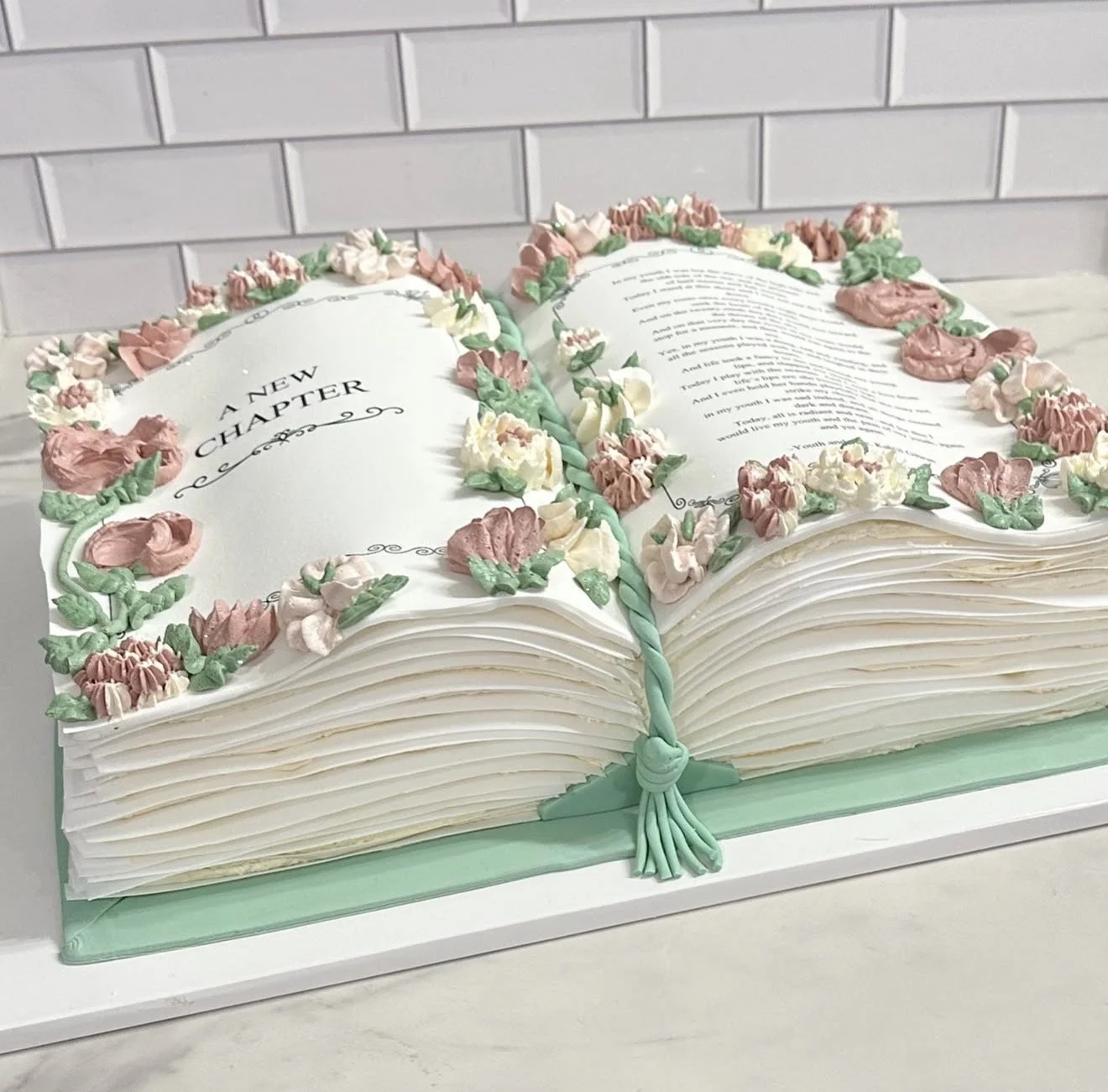 vegan book-shaped cake with vintage floral piping by Veg on Board