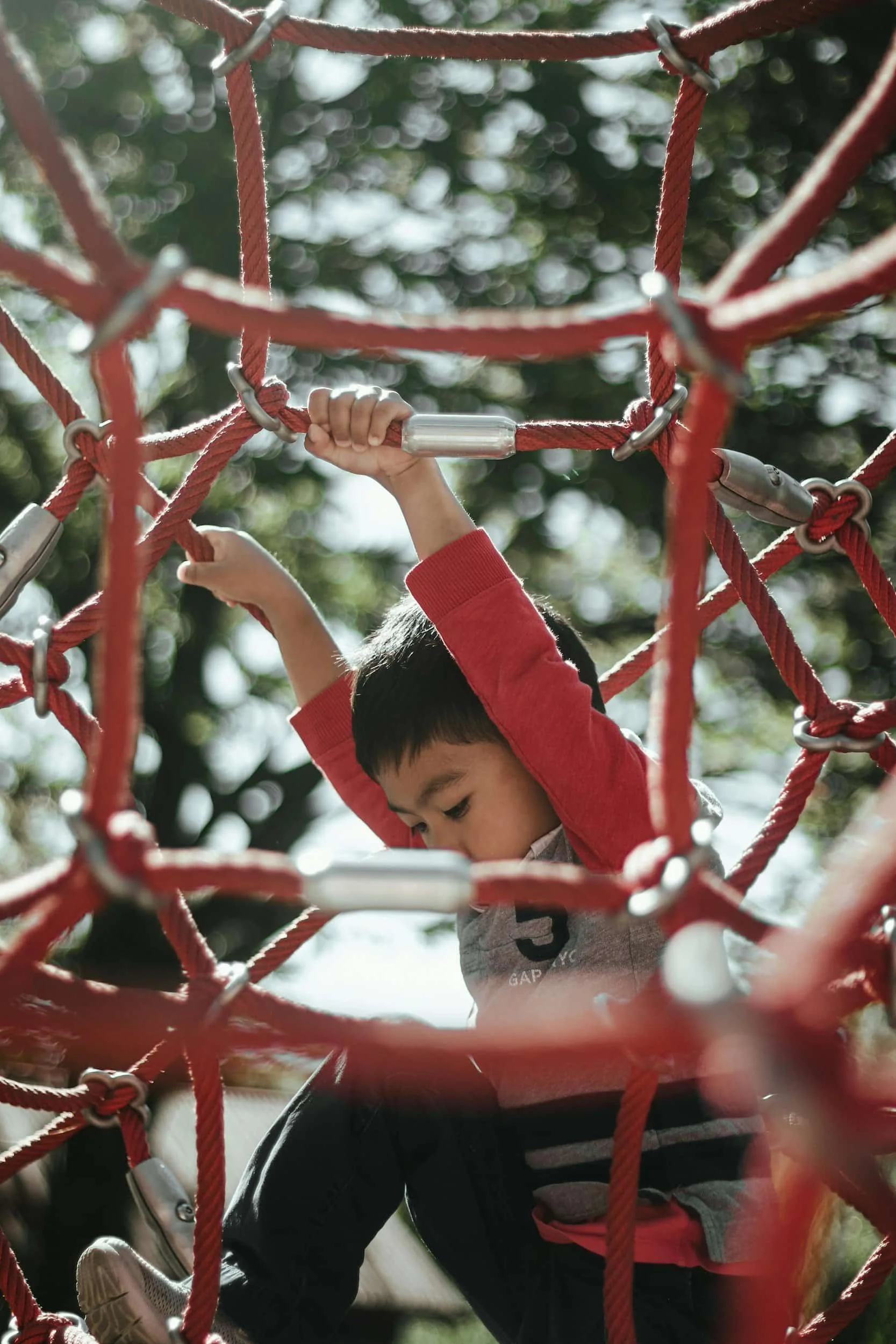 Child practicing gross motor skills during pediatric physical therapy
