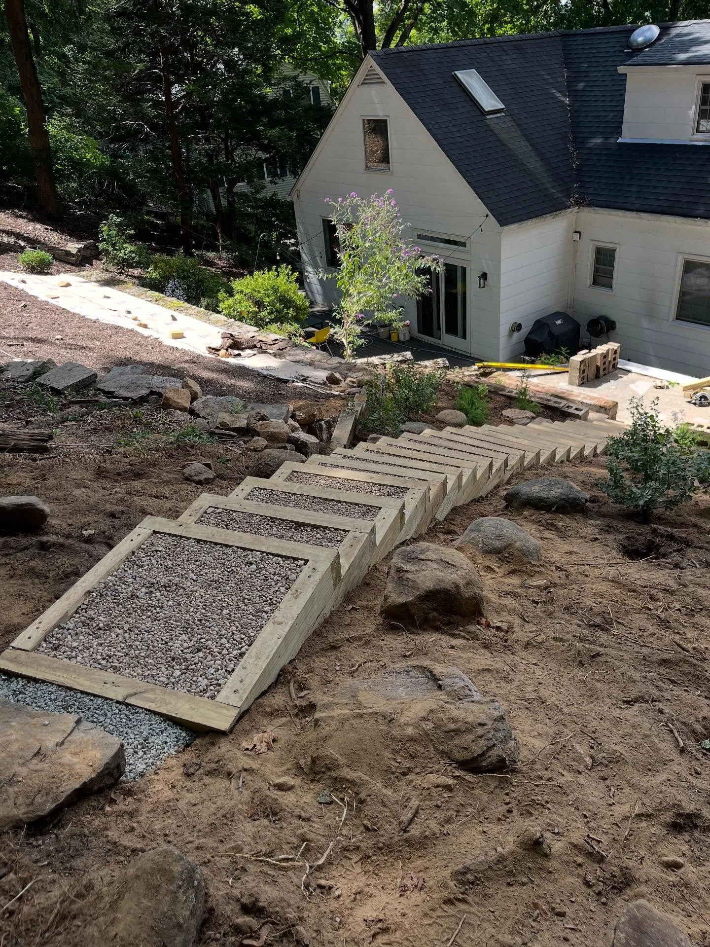 One step at a time, folks.  That&rsquo;s the only way up any mountain &mdash; or in this case a steep little hill that cut off these homeowners from a big, wild, wooded portion of their backyard.  Now it&rsquo;s not just the deer who can enjoy the ba