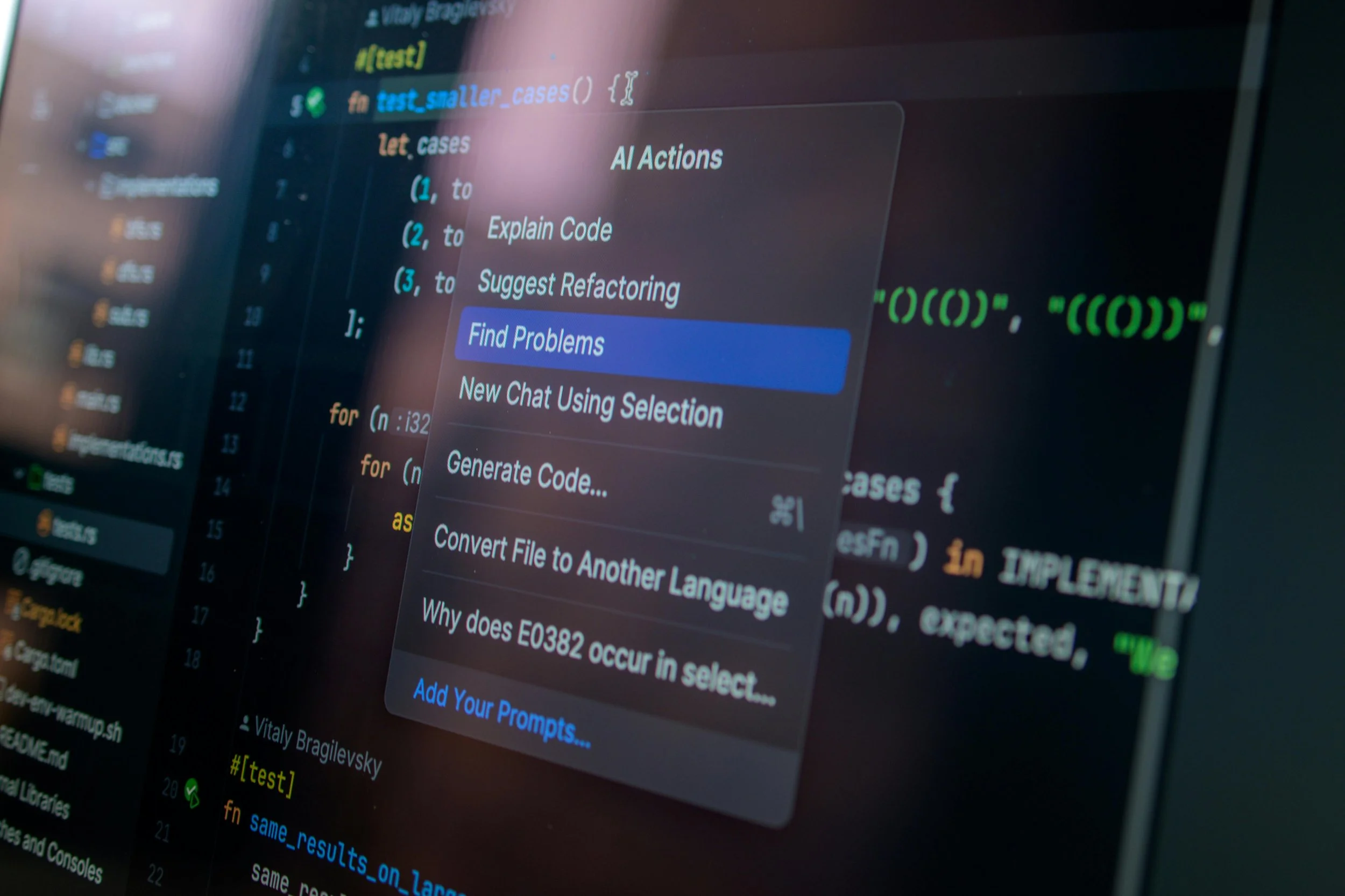 Image of a screen that says AI Actions, with computer code in the background