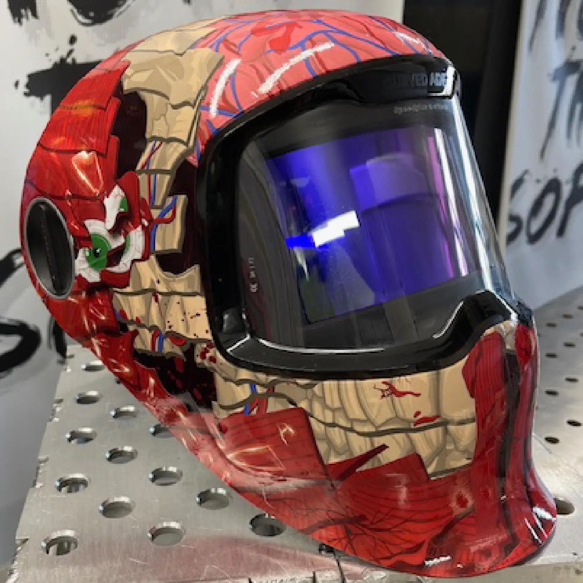Tiging Them Softly G5-02 welding helmet wrap — anatomical skull-inspired vinyl design blending bone and muscle detail for TIG welders.