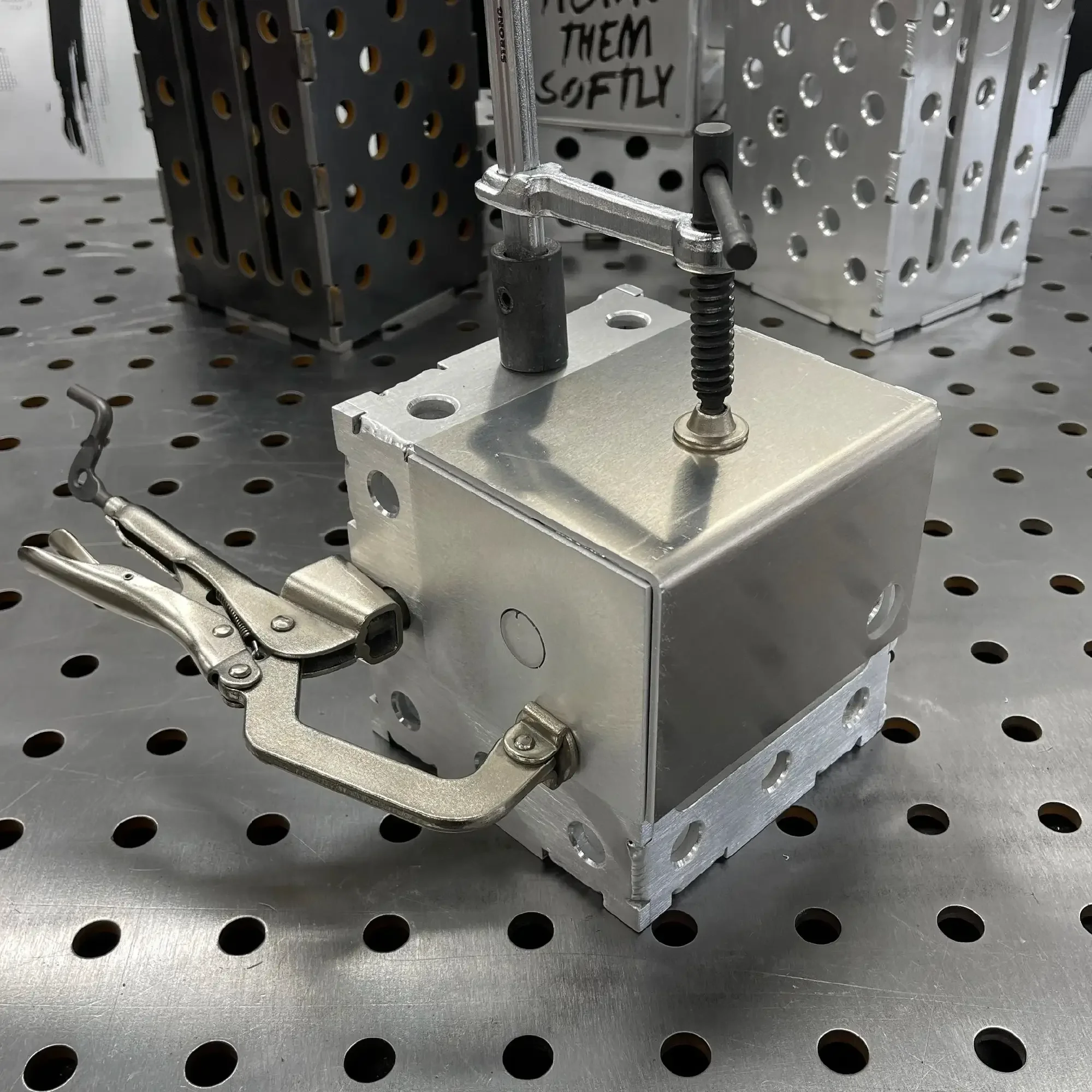 Aluminium TIG Fixture Kit 6×6 Cube clamped on welding table with Vise-Grip and hold-down clamp