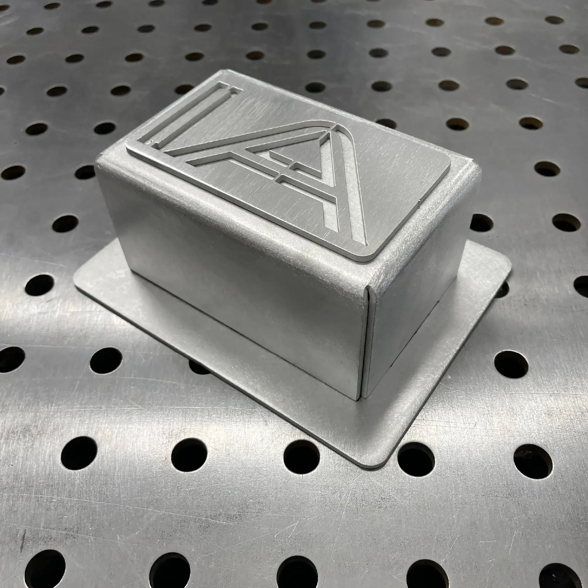 Assembled aluminium TIG “Box It Up” kit — IA-FAB logo plate mounted on top of aluminium box fixture