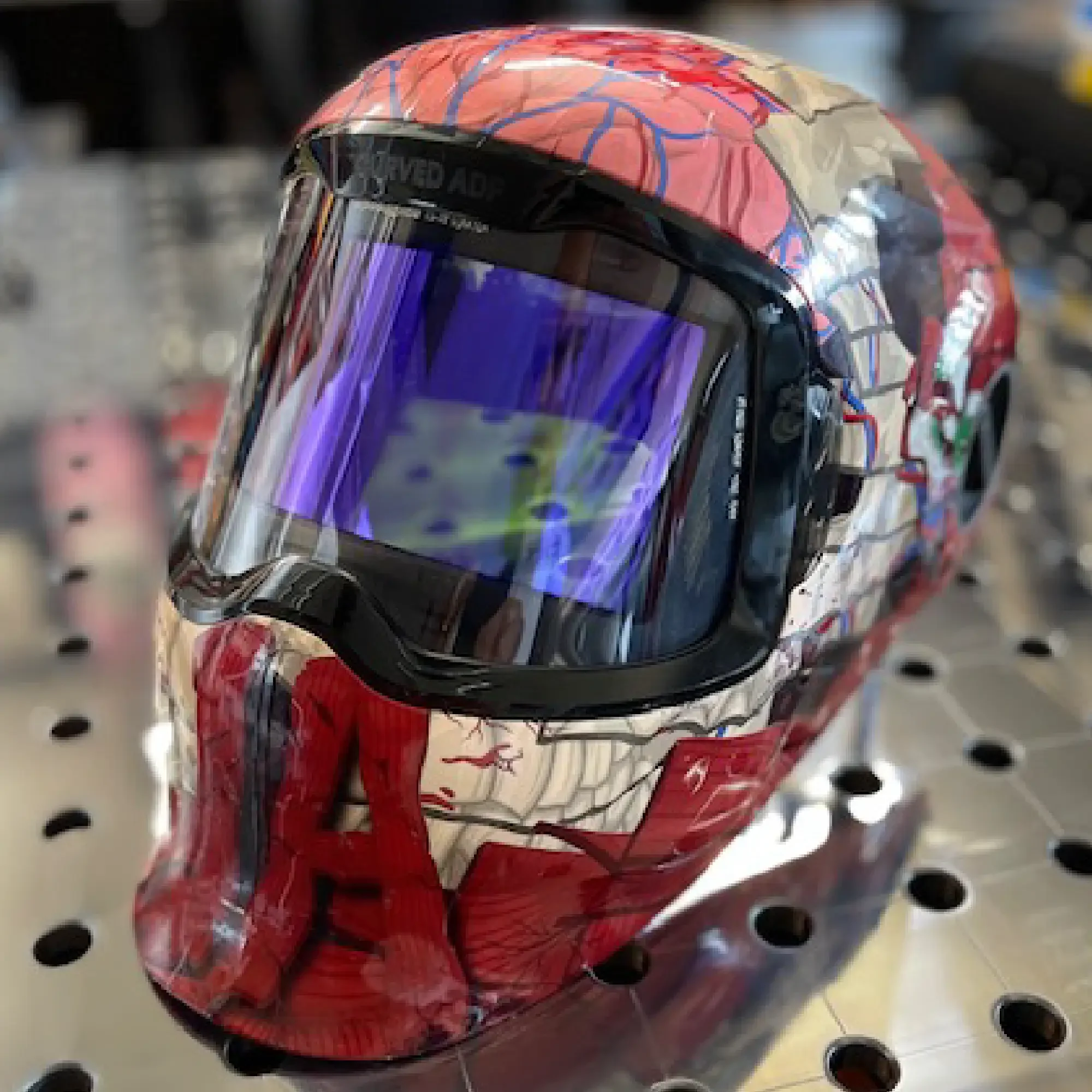 Flesh G5-02 Welding Helmet Wrap – close-up of red muscle detail and gloss vinyl finish