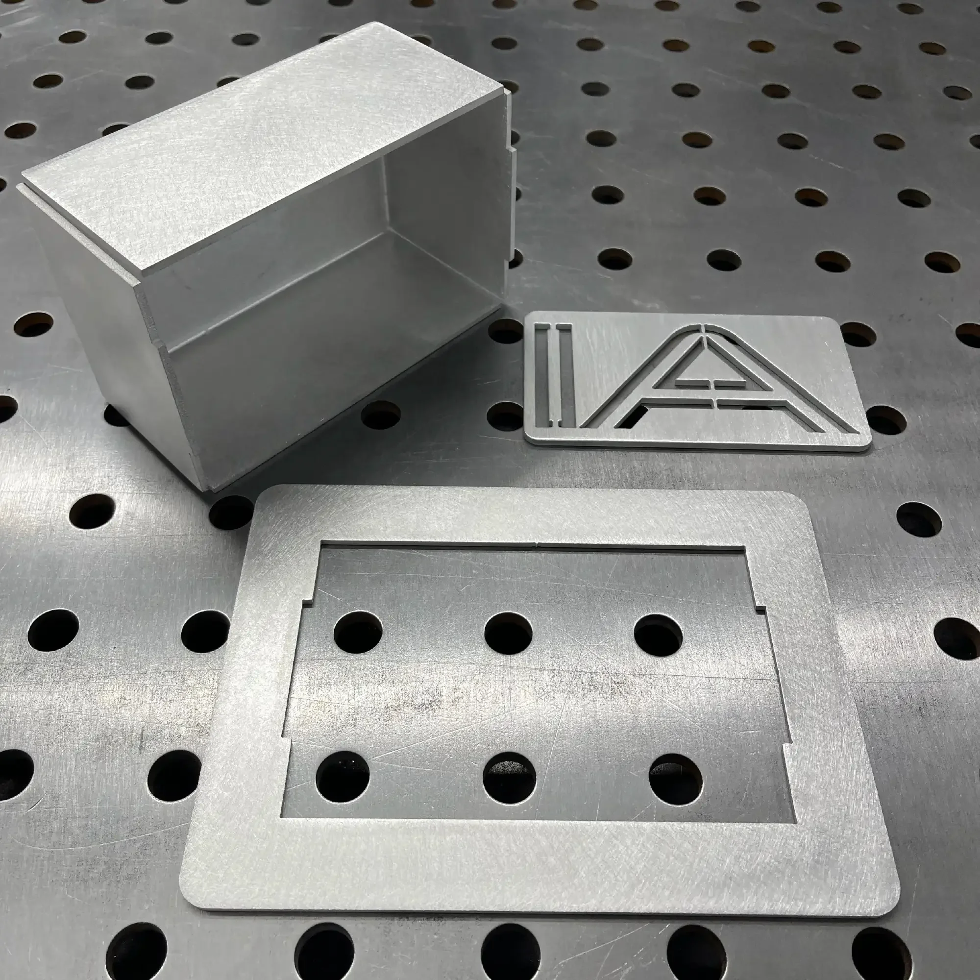 Unassembled aluminium TIG Practice KIT-3 “Box It Up” — laser-cut 5052-H32 aluminium plates on welding table