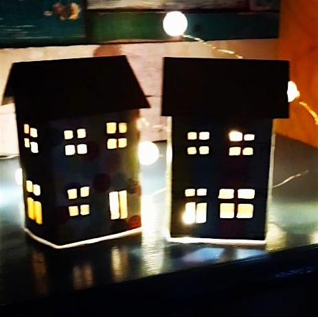 button-and-tape-measure-houses-lit.jpg