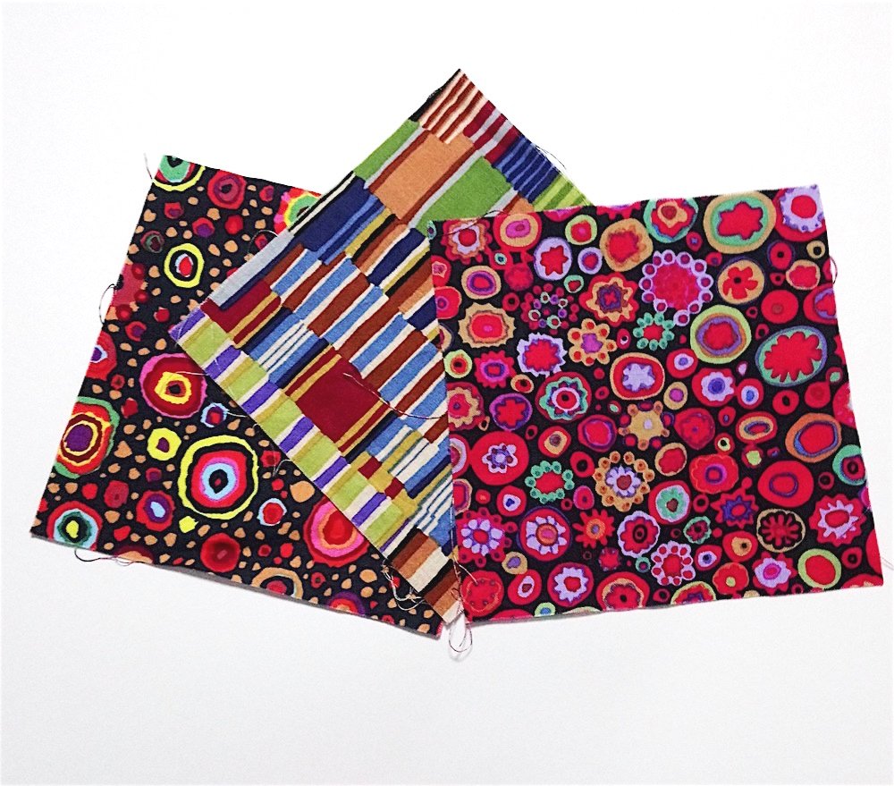 three-chosen-fabrics-from-kaffe-fassett-charm-pack.jpg