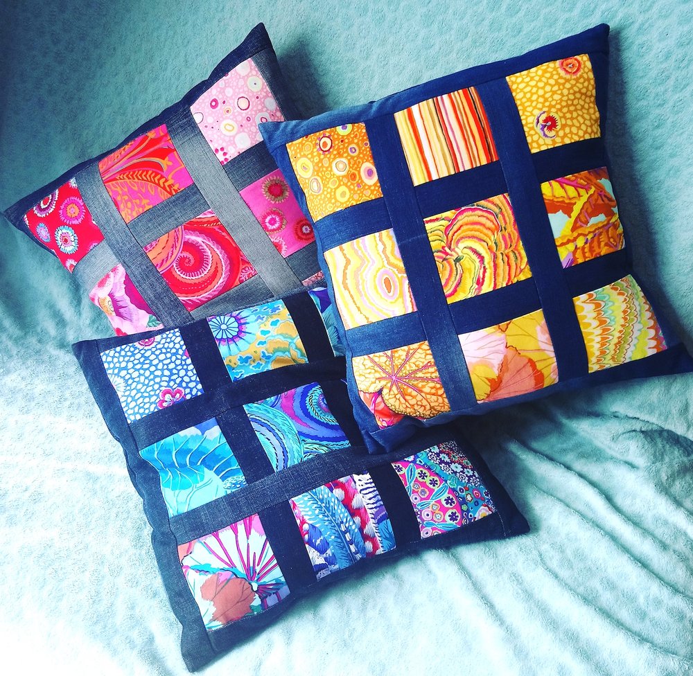 All three colourful patchwork cushions by Jennifer Mills.jpeg