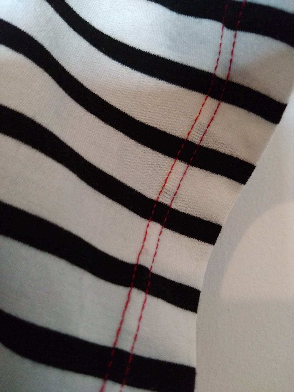 Red twin needle stitch on striped T shirt.JPG