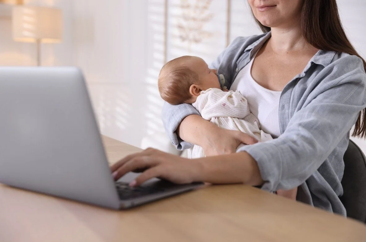 Baby playing with computer mouse