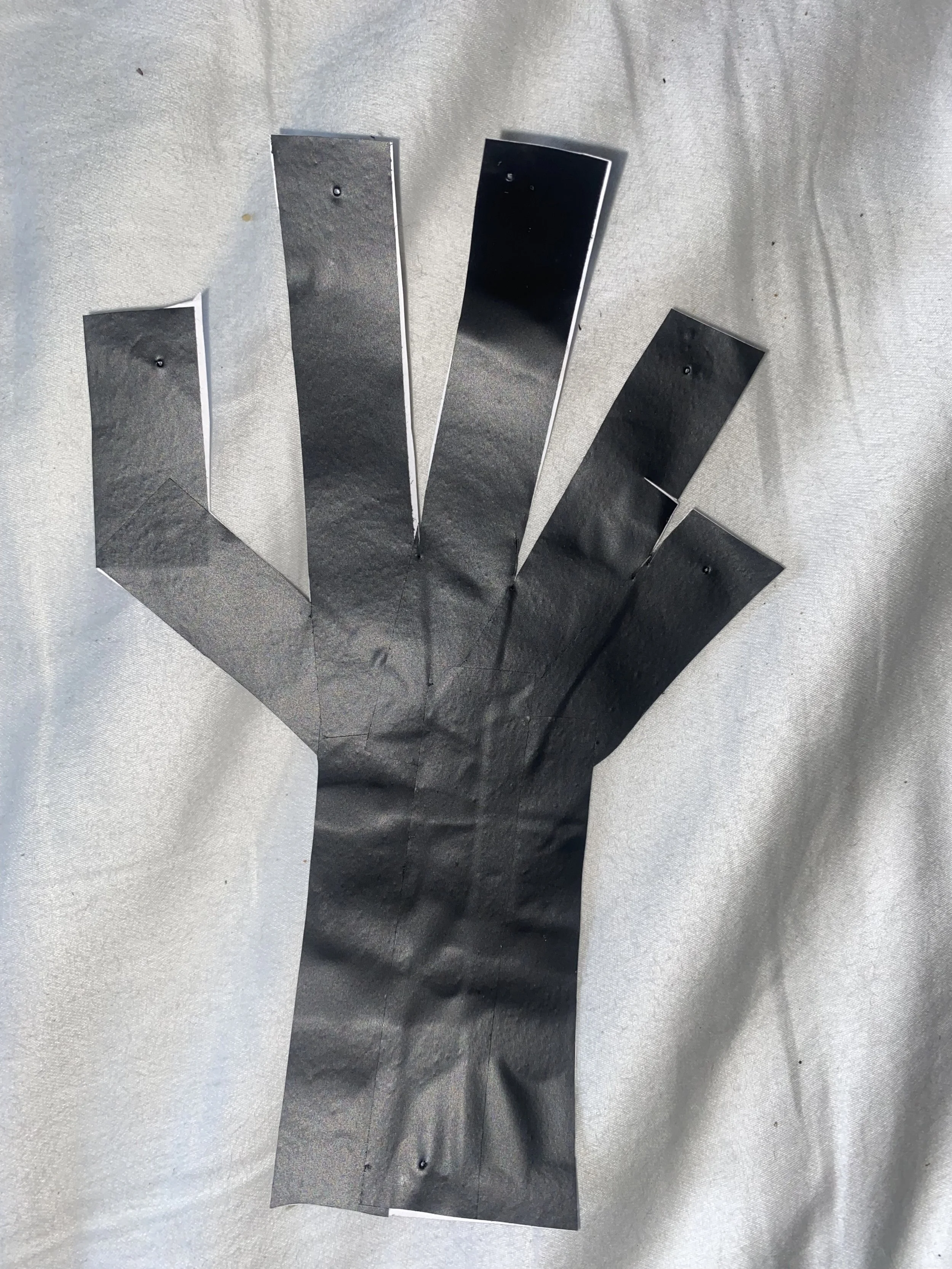 Hand out of electrical tape