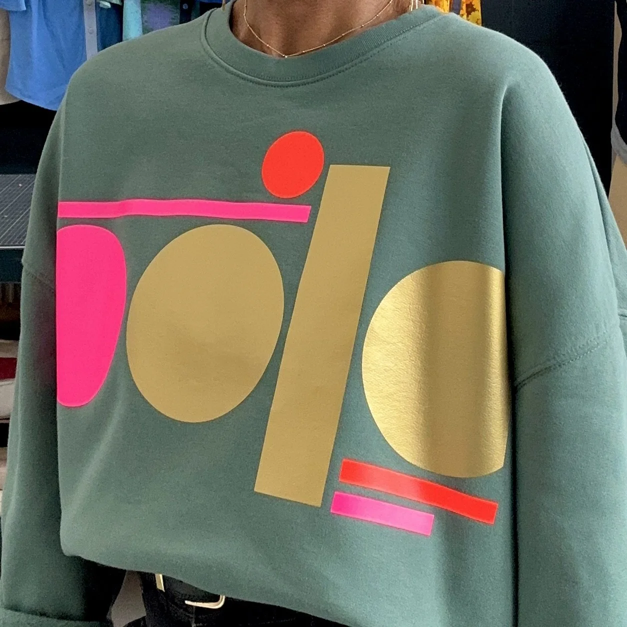 tag-gold-and-neon-teal-sweatshirt-3.jpg