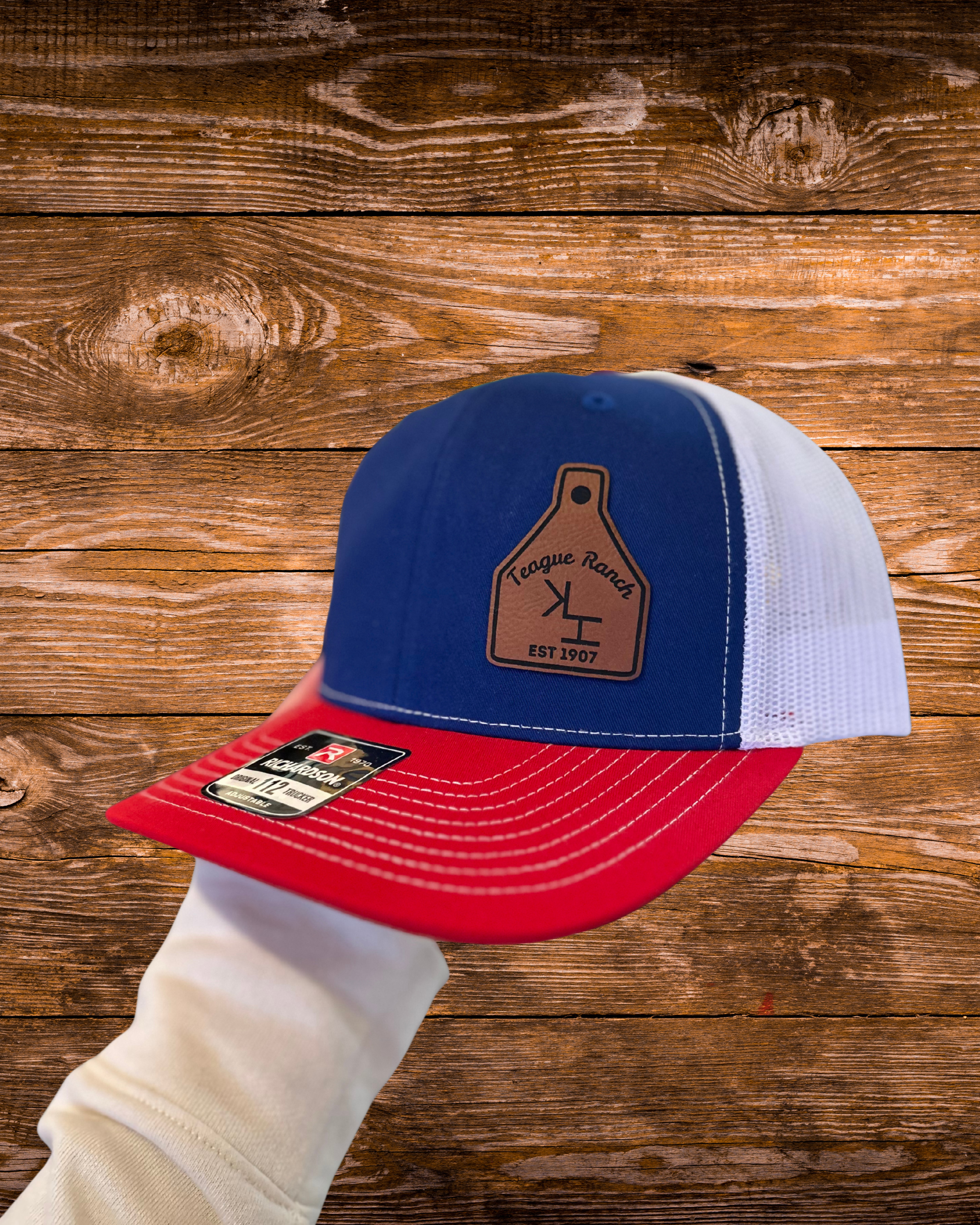 Leather patch hat with cow tag for Teague Ranch