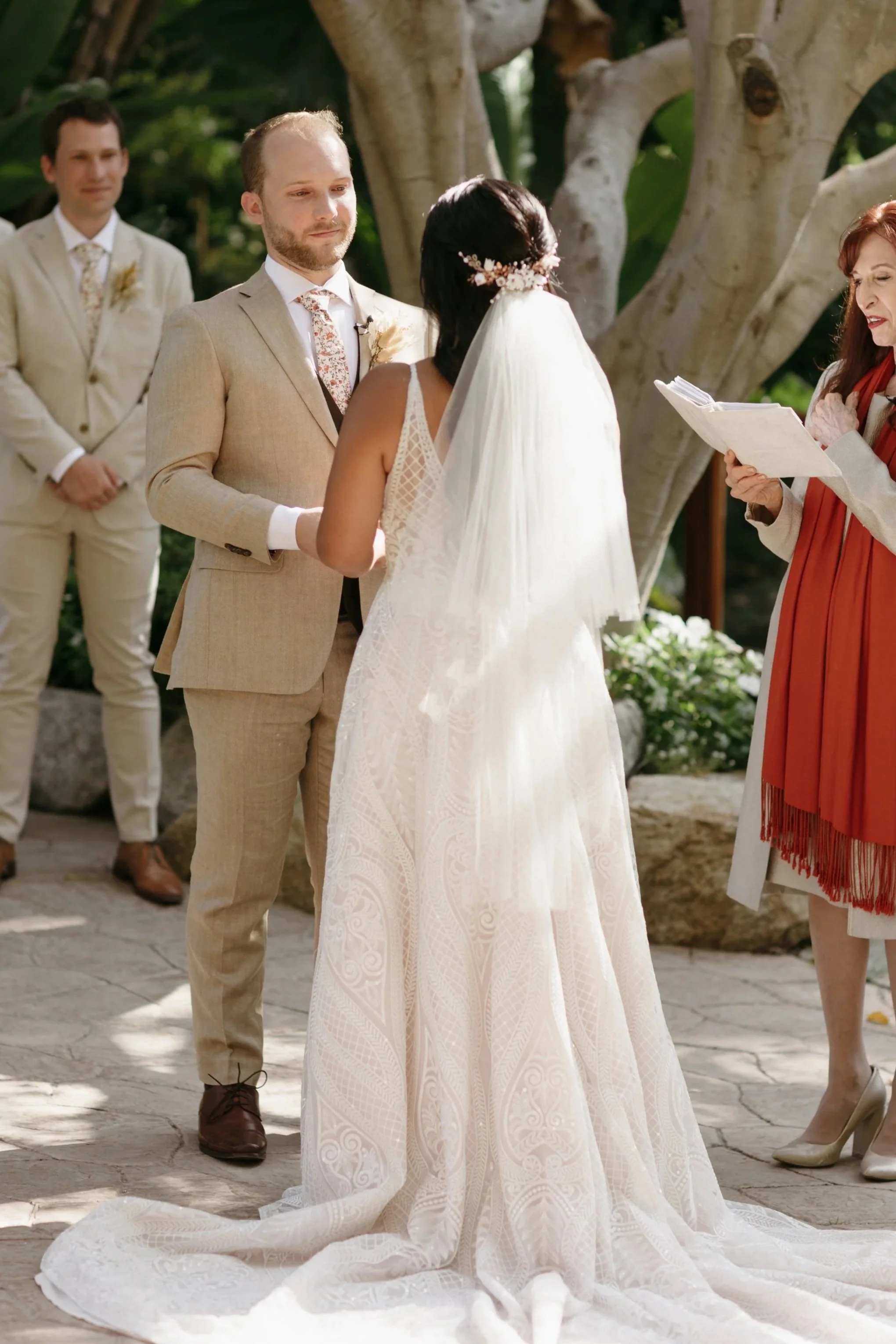 Romantic bohemian bride wearing custom designed floral hair comb