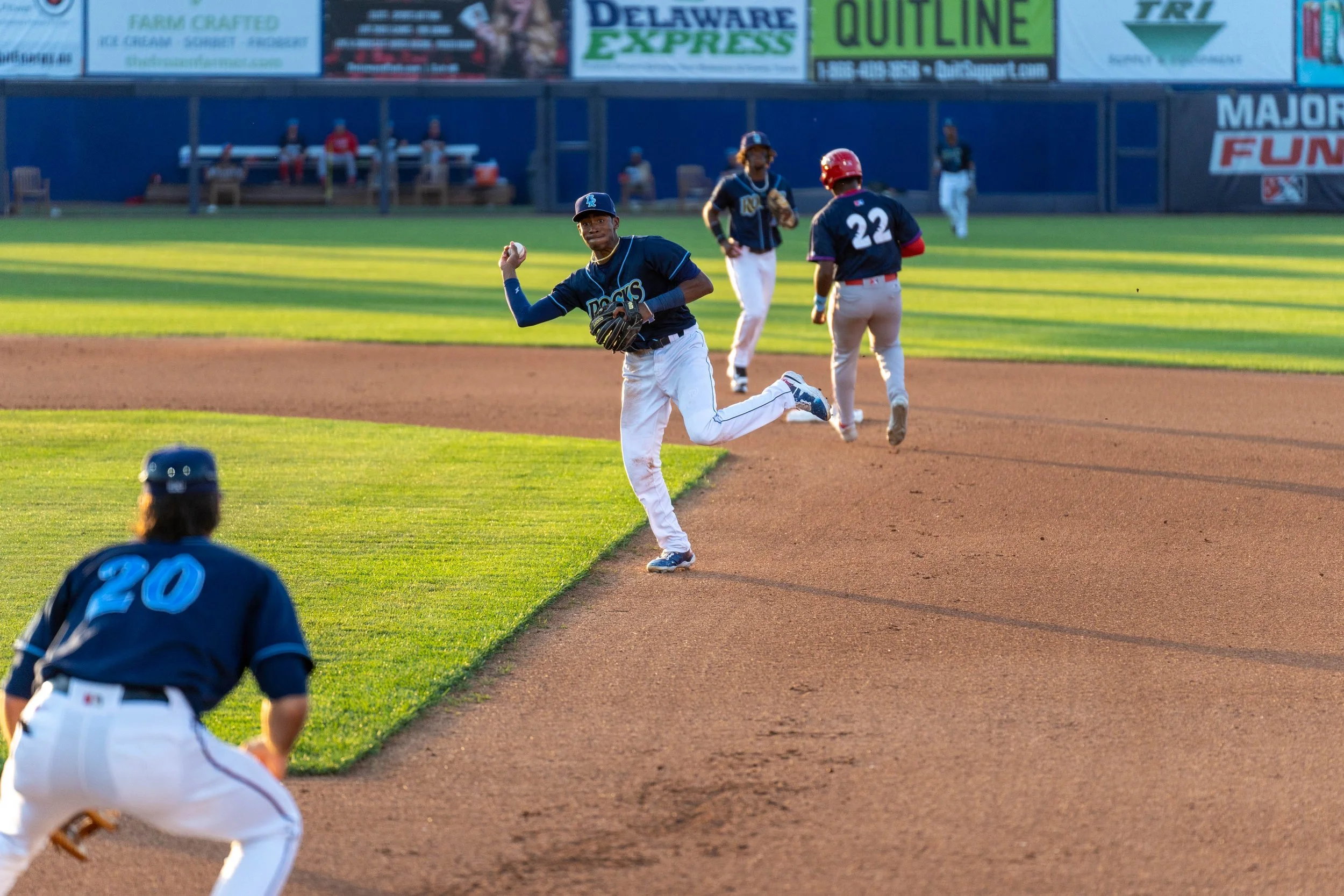 DSC06935_220629_Baker throwing to first.jpg